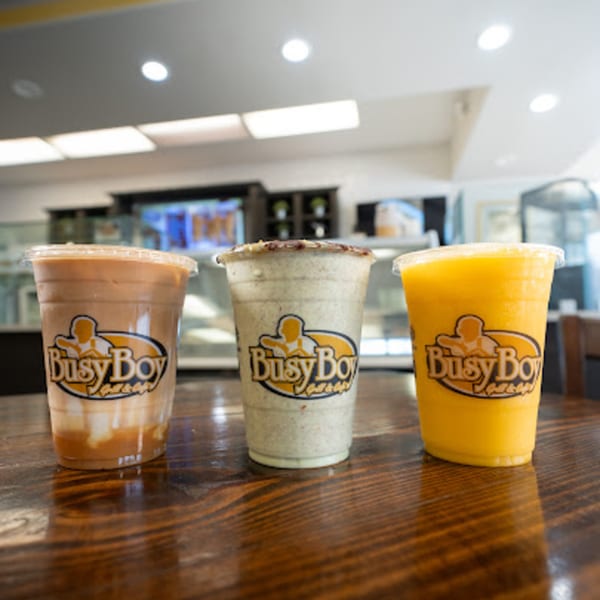 Three Busy Boy Mediterranean Grill & Cafe drinks: iced coffee, cookies and cream, and mango smoothie.